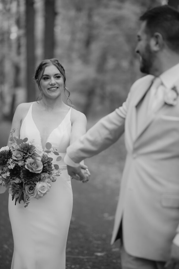 groom leading bride by hand at pen ryn estate