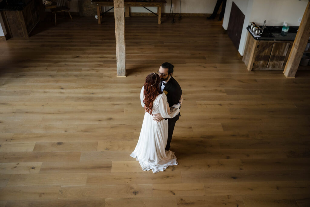 bride and groom kissing  at reception at woolverton inn