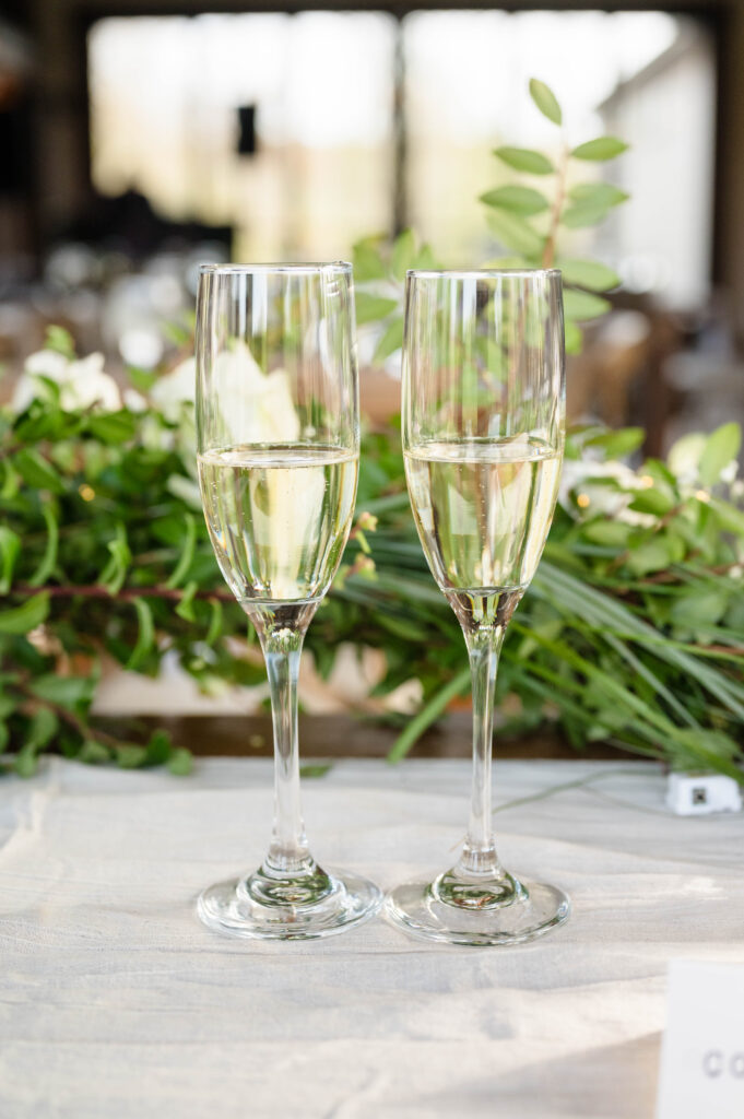 wedding champagne flutes on sweetheart table